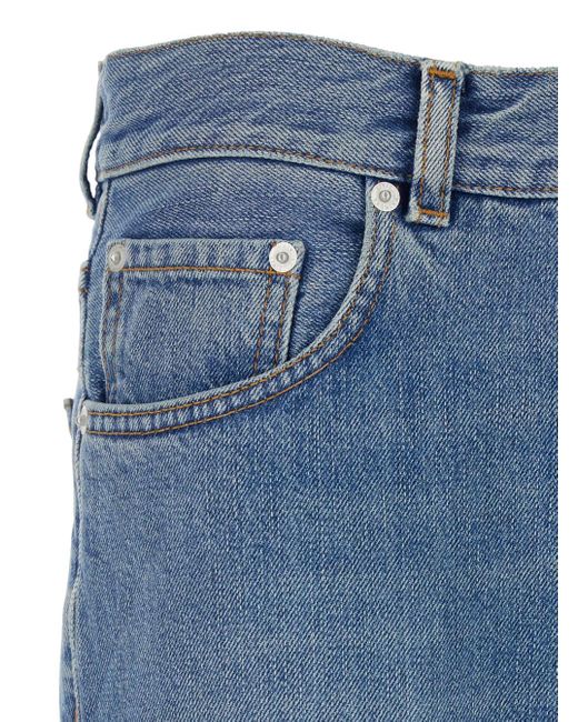 Haikure Blue Jeans With Five Pocket Design And Logo Patch On The Back