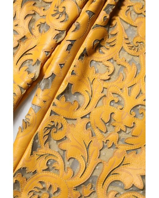 Dolce & Gabbana Yellow Floral Laser Cut Leather Pants for men
