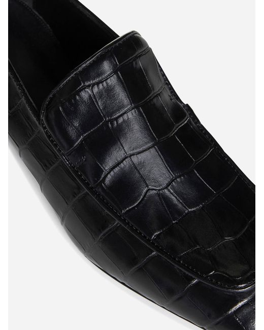 Totême  Black Animalier Embossed Leather Loafers