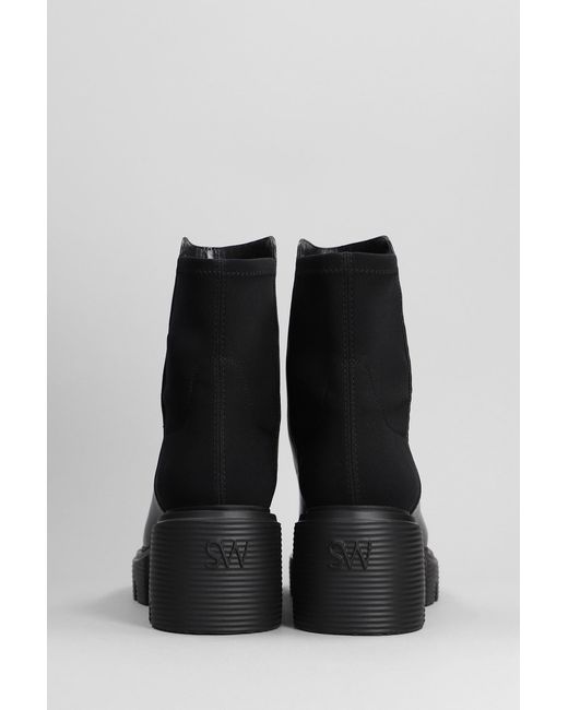 Stuart Weitzman 5050 Soho Bootie Combat Boots In Black Leather | Lyst