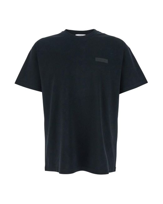 Givenchy Black Crewneck T-Shirt With Logo Patch On The Front for men