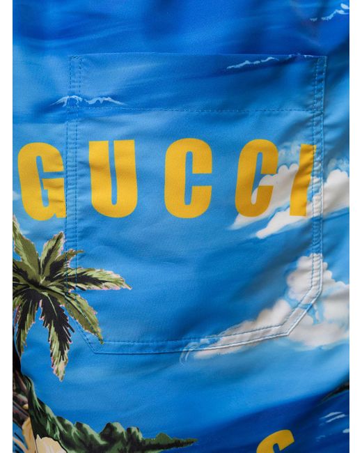 Gucci Blue Light- Swim Shorts With All-Over Graphic Print for men