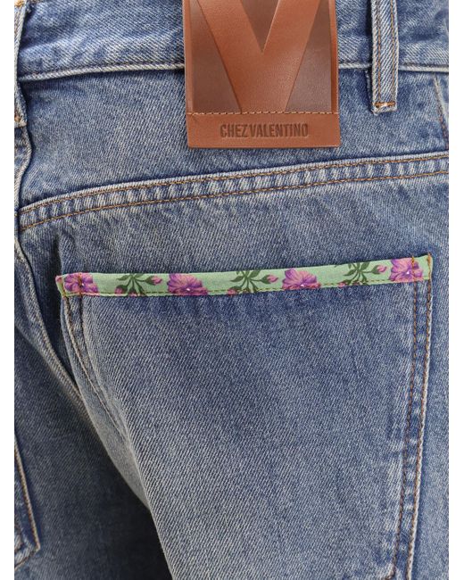 Valentino Blue Jeans With Floral Print Fabric Border Detail