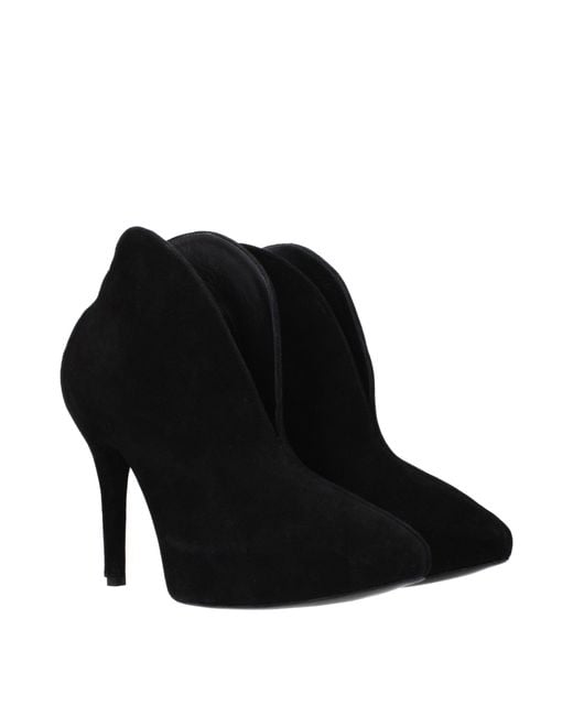 Alaïa Black Leather Ankle Boots