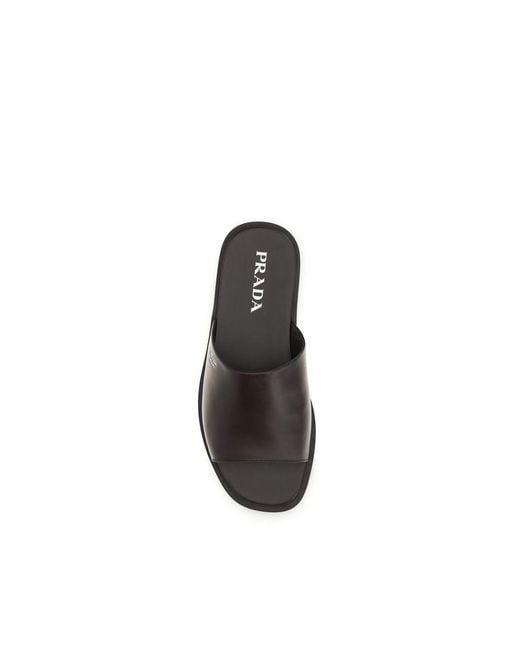 Prada Black Calf Leather Bos Taurus Flat Sandals for men