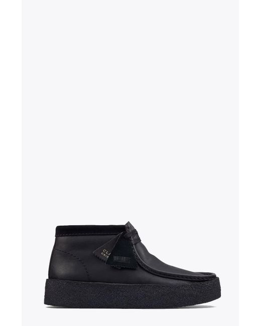 black and white wallabees