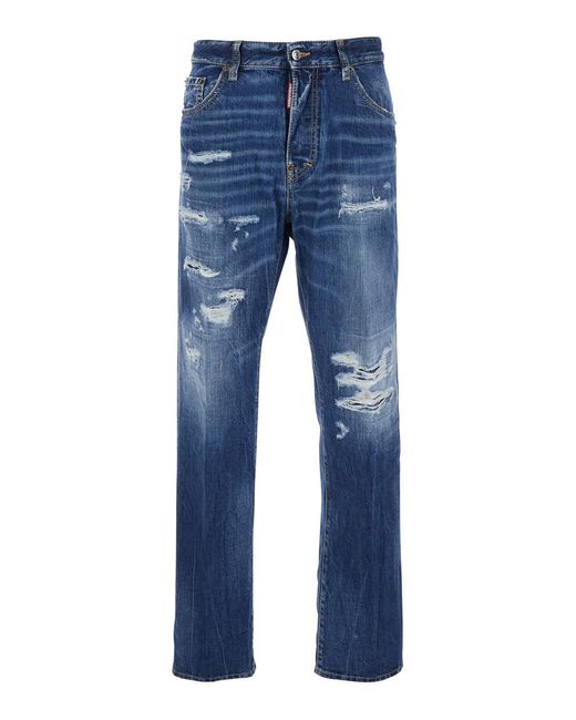 DSquared² Blue Jeans 642 With All-Over Ripped Details And Logo Patch On The Back for men