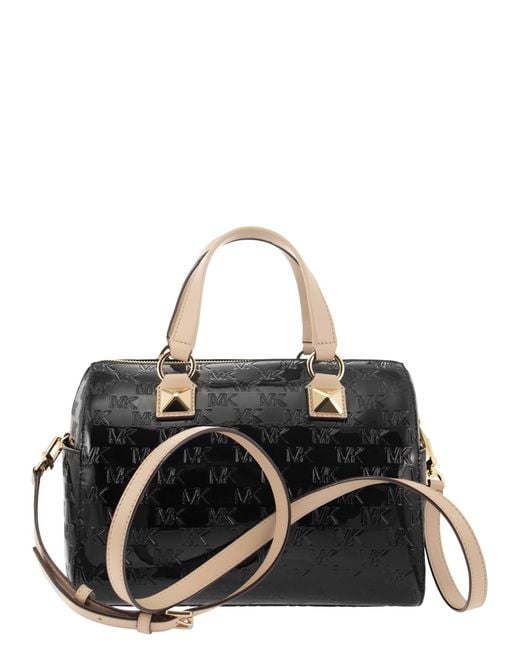 Michael kors black purse 2024 with tan straps