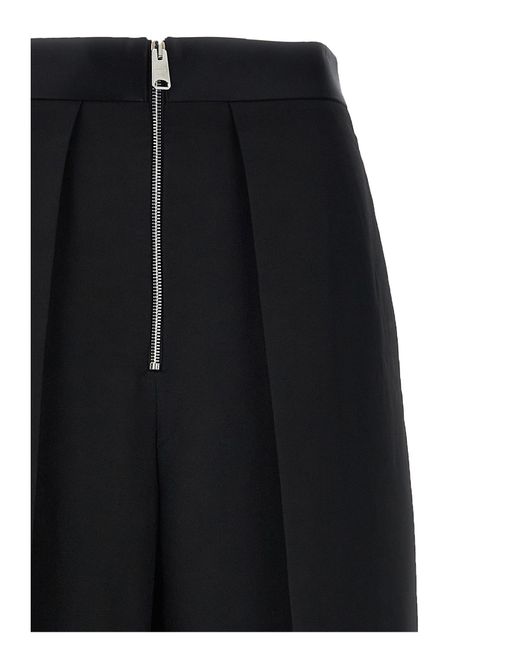 Khaite Black Straight Leg Pants With Pleat Detailing And Exposed Zipper