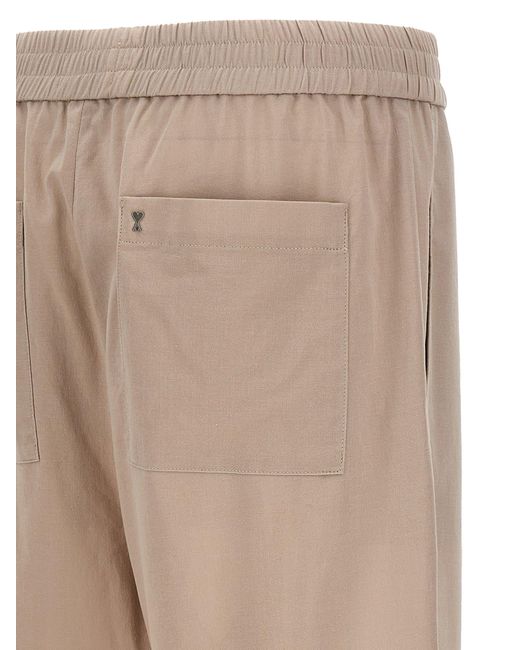 AMI Natural Logo Plaque Trousers for men