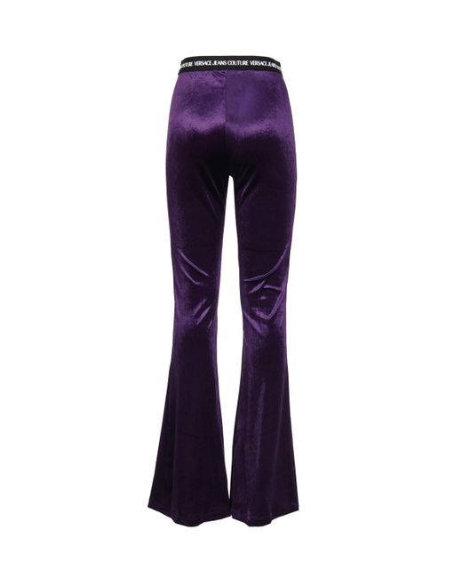 Versace Blue Flared Trousers With Logo Band