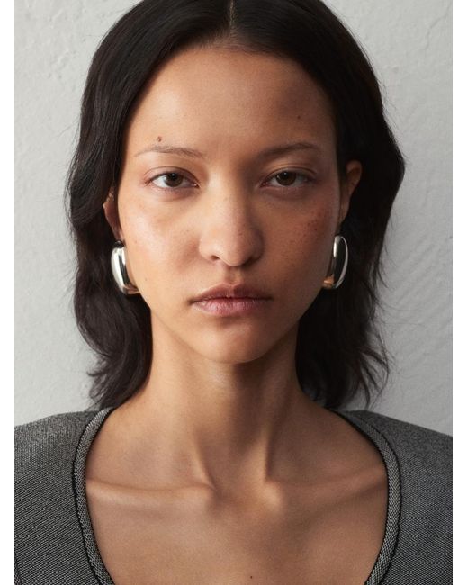 Orecchini Curvo di Jacquemus in White