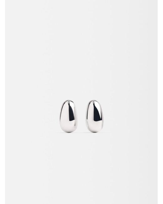 Orecchini Curvo di Jacquemus in White