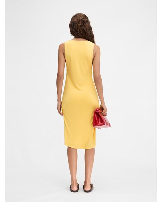 Jacquemus Yellow The Peplo Mini Dress