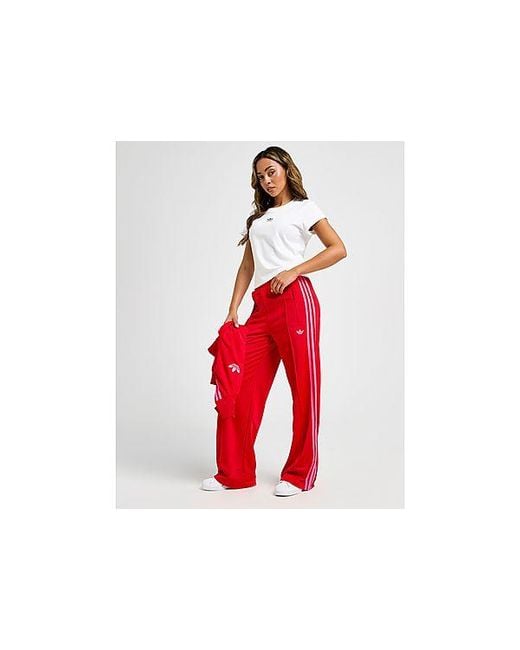 Pantalon De Survêtement Firebird Oversize Adidas Originals en coloris Red