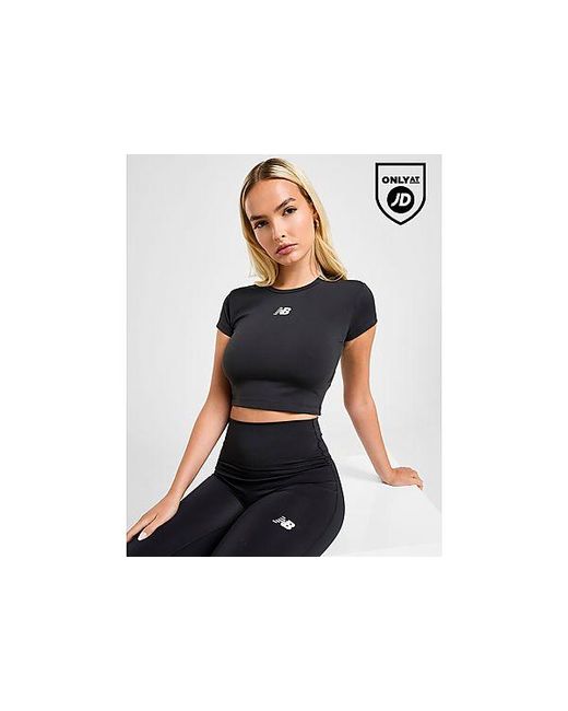 Essential Logo Baby Top di New Balance in Black