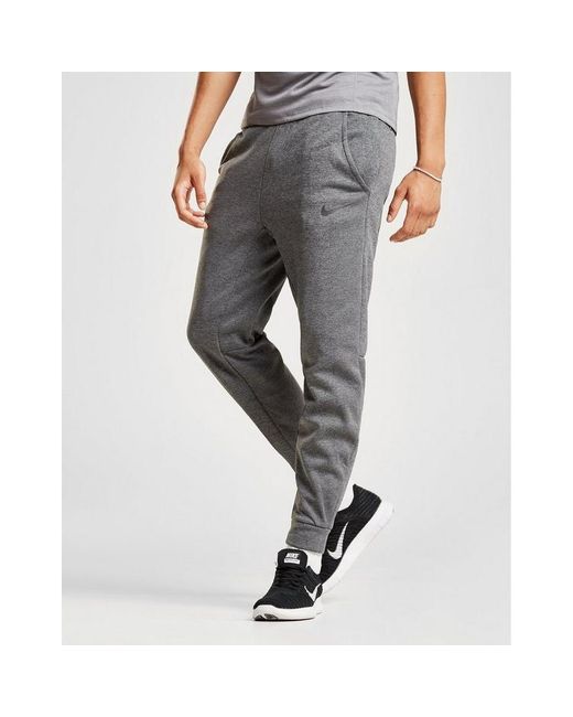 nike training therma tapered joggers in grey