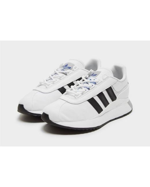 adidas originals sl andridge fashion trainers in white and pink