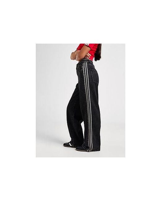 Denim Firebird Pantalone di Adidas Originals in Black