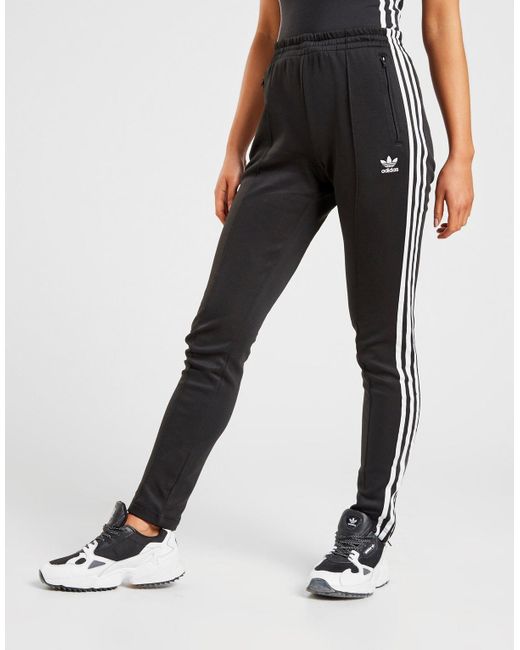 superstar track pants in black