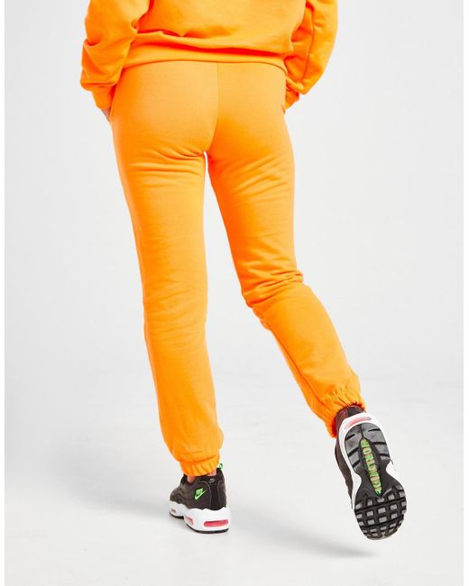 Nike Swoosh Joggers in Orange - Lyst
