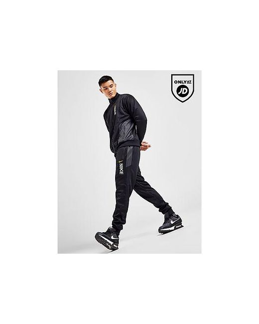 Hybrid Poly Knit Track Pants Nike pour homme en coloris Noir | Lyst