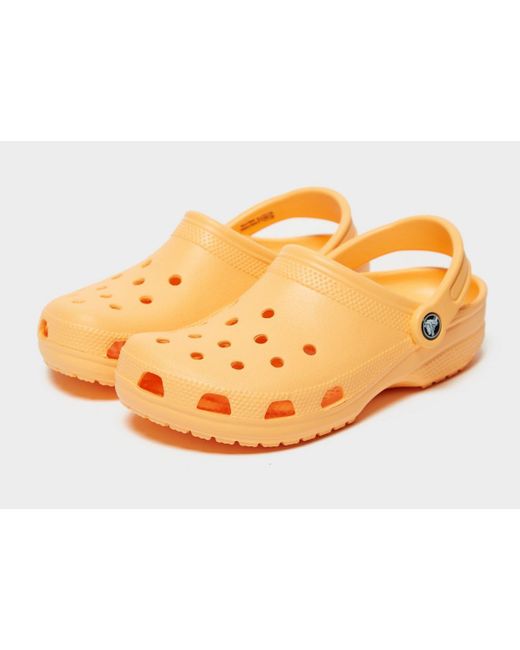 crocs orange clogs