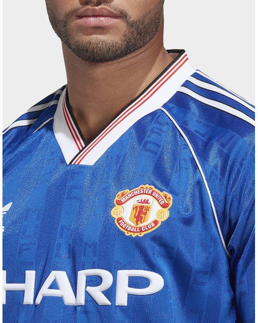 Retro blue man united hot sale shirt
