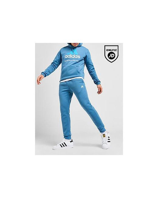 Pantaloni della Tuta Logo Badge Of Sport di Adidas in Blue da Uomo
