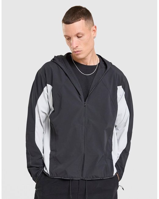 Veste Tech Sun Shell Nike pour homme en coloris Gray