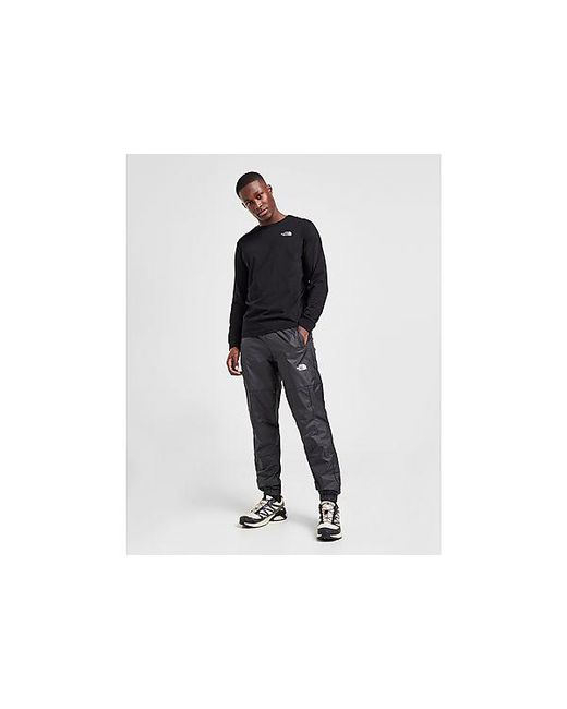 The North Face Mountain Athletics Woven Track Pants in Black for