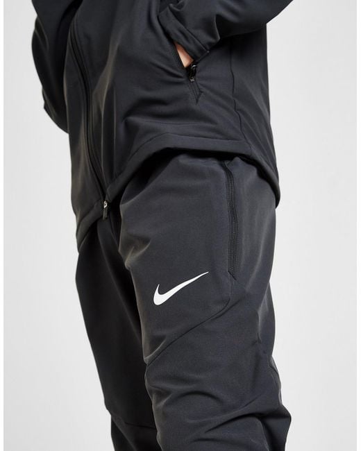 nike shield woven track pants