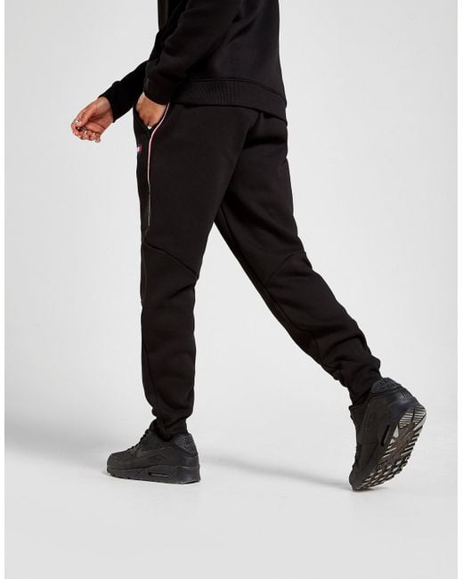 Tommy Hilfiger Cotton Tri Tape Track Joggers in Black for Men - Lyst