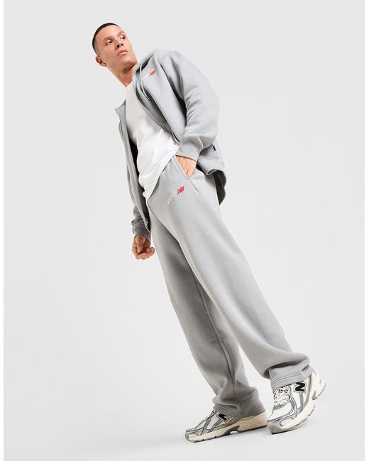 Pantalon De Jogging Ourlet Ouvert New Balance pour homme en coloris Black
