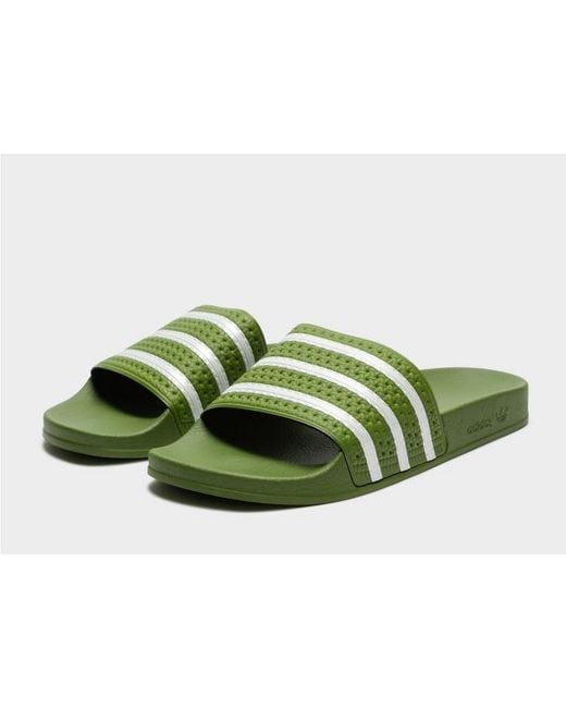 olive green adidas slides