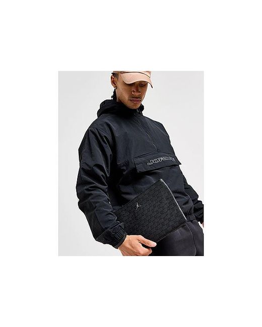Borsa a sacchetto Monogram di Nike in Black