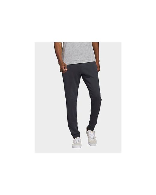 Adidas Black Essentials+ Dye Sweat Pants for men