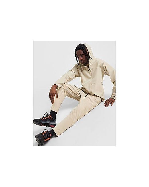 Nike Black Unlimited Woven Track Pants for men