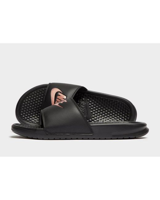 black nike slides with rose gold