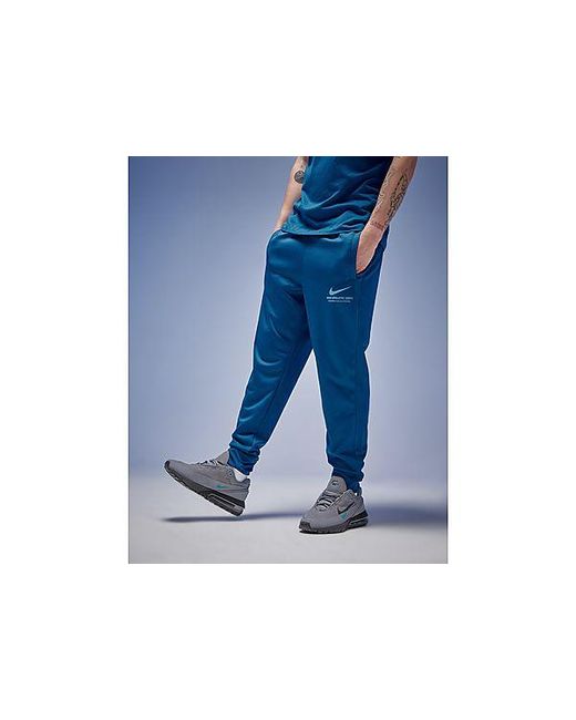 Athletic Poly Track Pants di Nike in Blue da Uomo