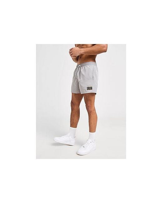 EA7 Black Gold Badge Swim Shorts for men