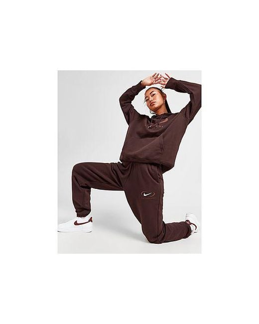 Nike swoosh oversized online joggers in black