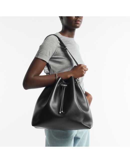 Jimmy Choo Black Cinch L
