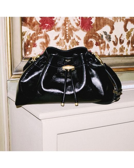 Jimmy Choo Black Cinch Medium