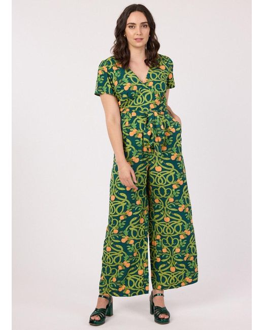 Joanie Clothing Jerry Serpents And Apples Print Jumpsuit in Green | Lyst