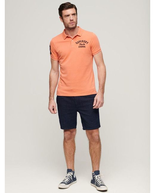 Superdry Orange Superstate Polo Shirt for men