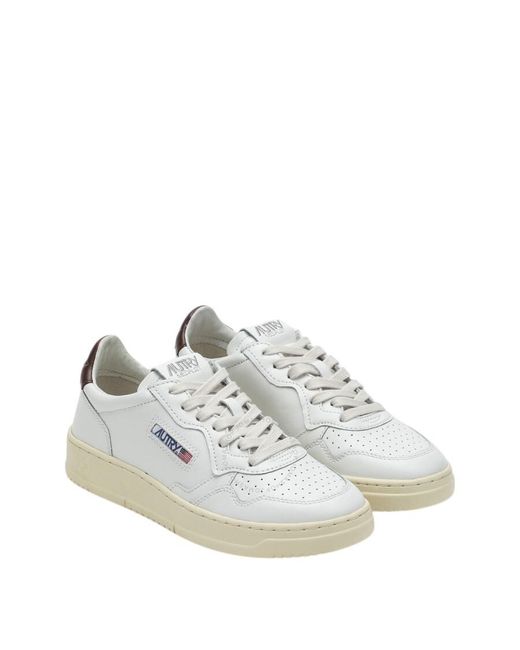 Autry White Medalist/ Leather Trainer