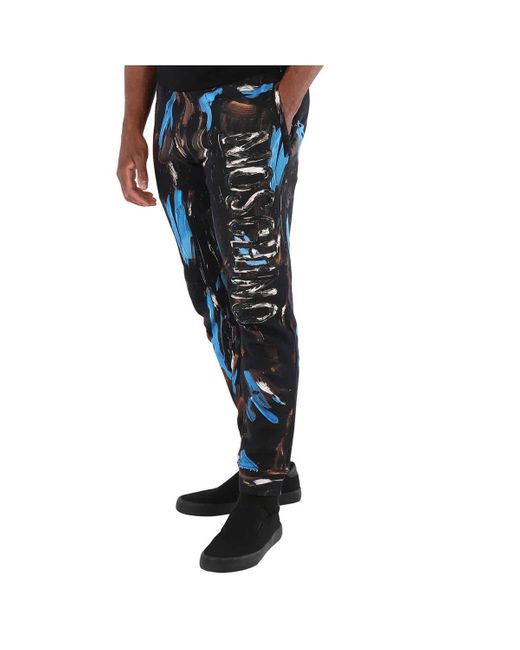 Moschino Black Painted Logo Cotton-jersey Trousers for men