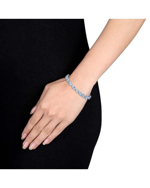 Amour Blue 28 1/2 Ct Tgw Oval-Cut Sky- Topaz Tennis Bracelet for men