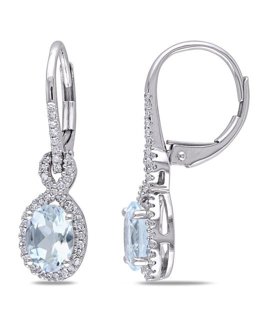 Amour Blue Oval Aquamarine And 1/4 Ct Tw Diamond Leverback Earrings